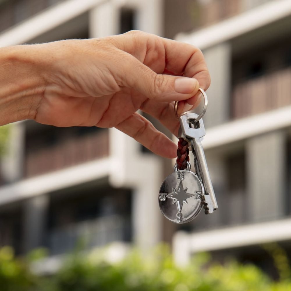 hand-holding-key-outdoors (1)